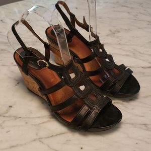 Flirty black wedge sandals with cork wedge heels